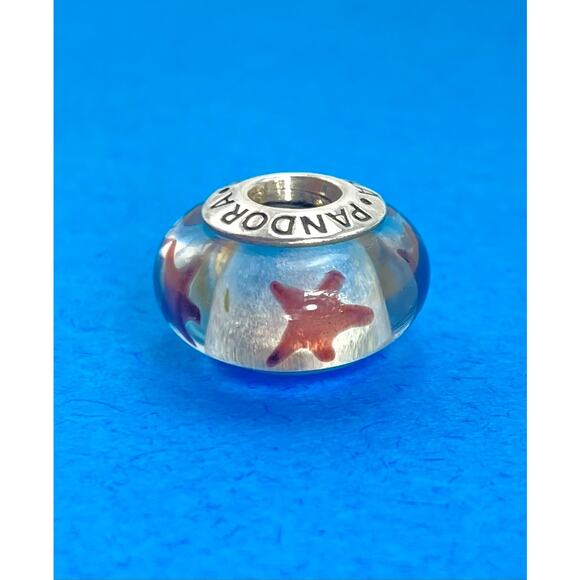 PANDORA Jewelry - Pandora Murano glass star charm
